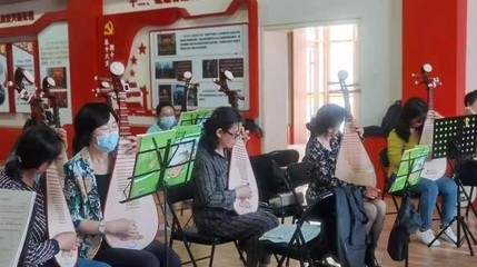 一揉玉弦萬般情，彈支紅曲給黨聽 文化藝術交流的深情頌歌